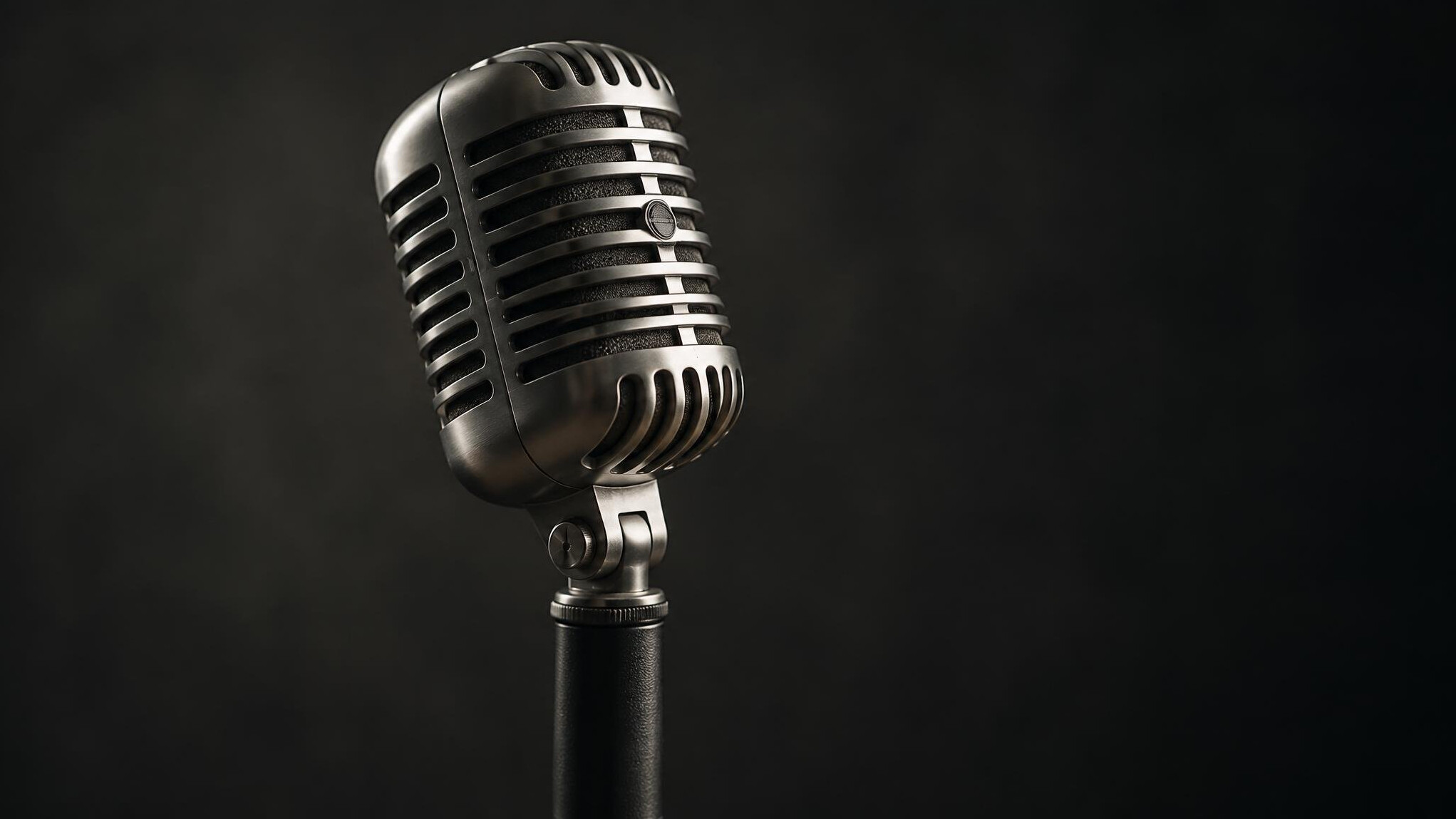 Close-up of a vintage studio microphone on a stand